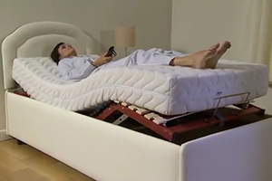 A women sleep in the  adjustable bed